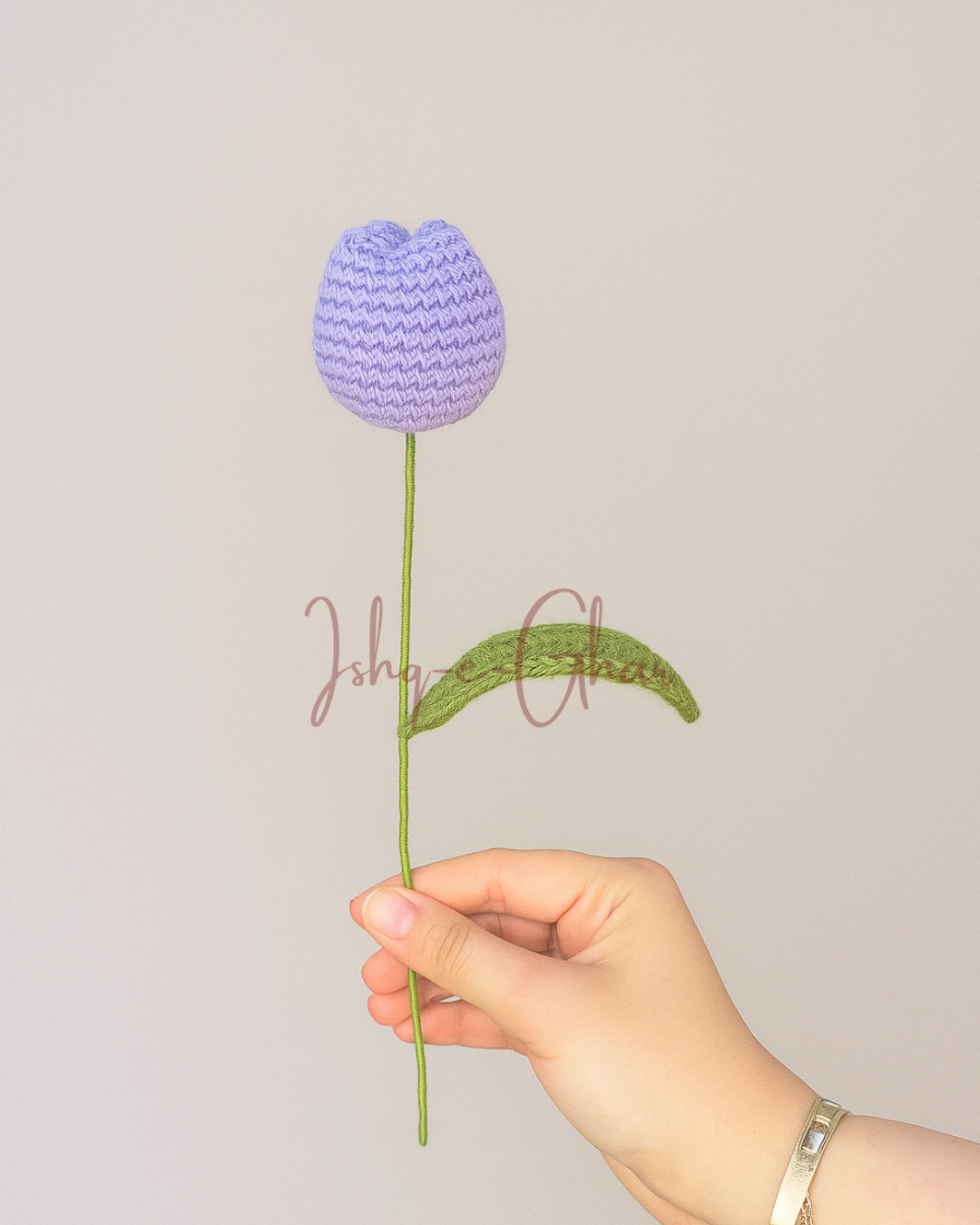 Guldaan White with 3 tulips (2 purple and 1 lavender)