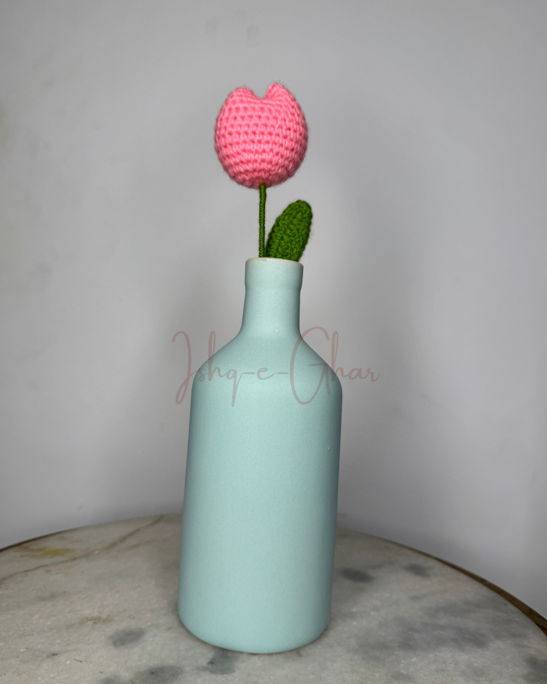 Khaaliq blue vase with pink tulip
