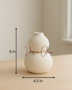 Guldaan White with 3 tulips (2 purple and 1 lavender)